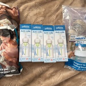 Dr. Brown's Anti-Colic Baby Bottles (4), Philips Avent bottles (3), MAM bottle